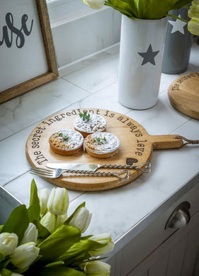 Secret ingredient round chopping board